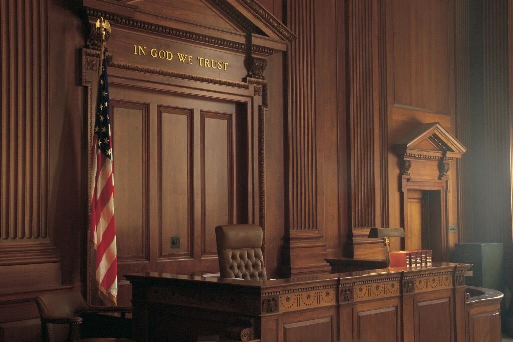 A view of en empty courtroom with chairs