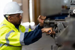 A man working on a machine.